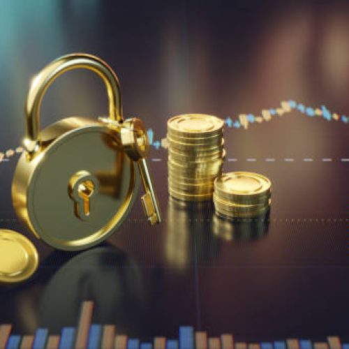 A stack of golden coins next to a secure padlock and key, representing financial security and investment. A graphical financial chart as background underscores the concept of growth and stability.